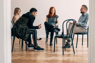 group of adults having their counseling